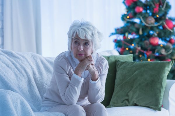 senior woman on sofa
